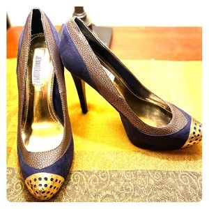 Navy blue heels with gold accent
